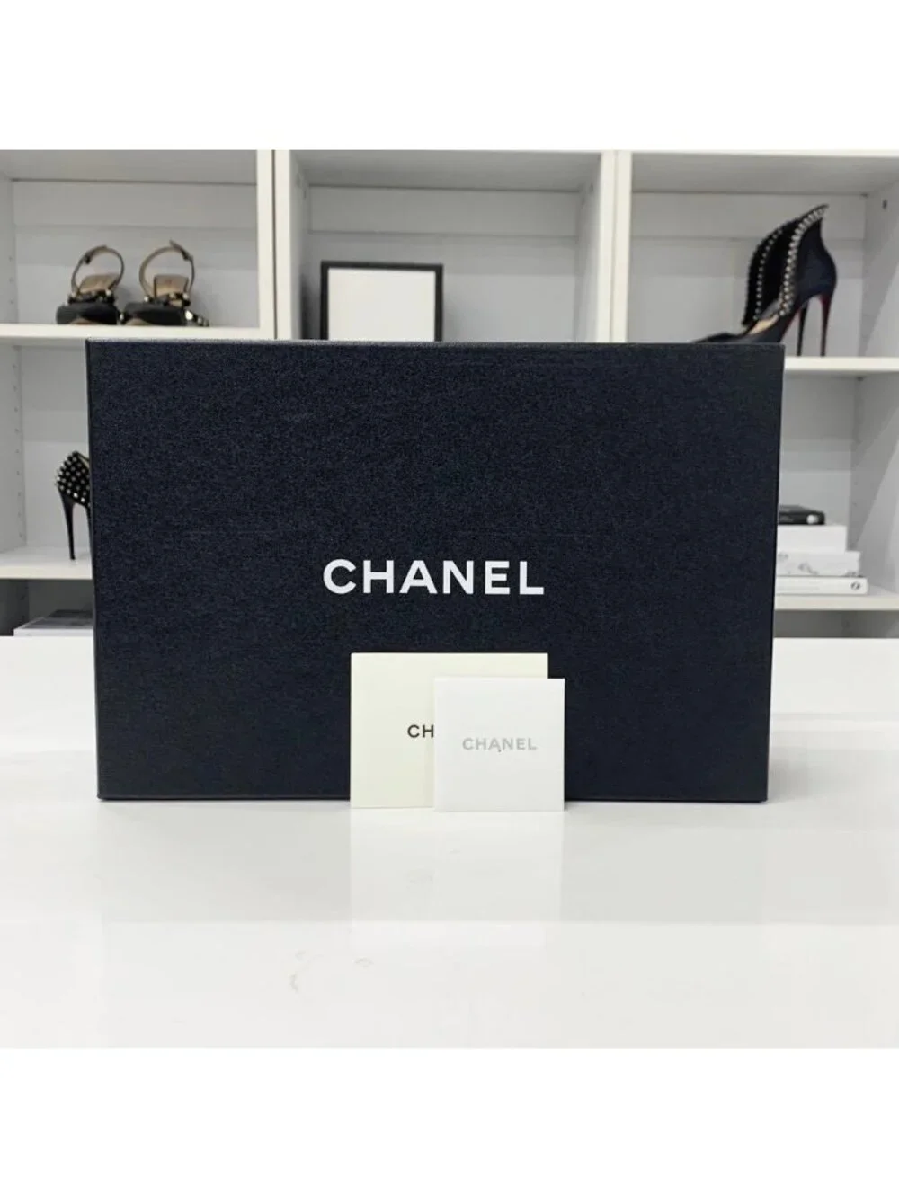Chanel CC Logo Camellia Patent Strap Thong Sandals Black